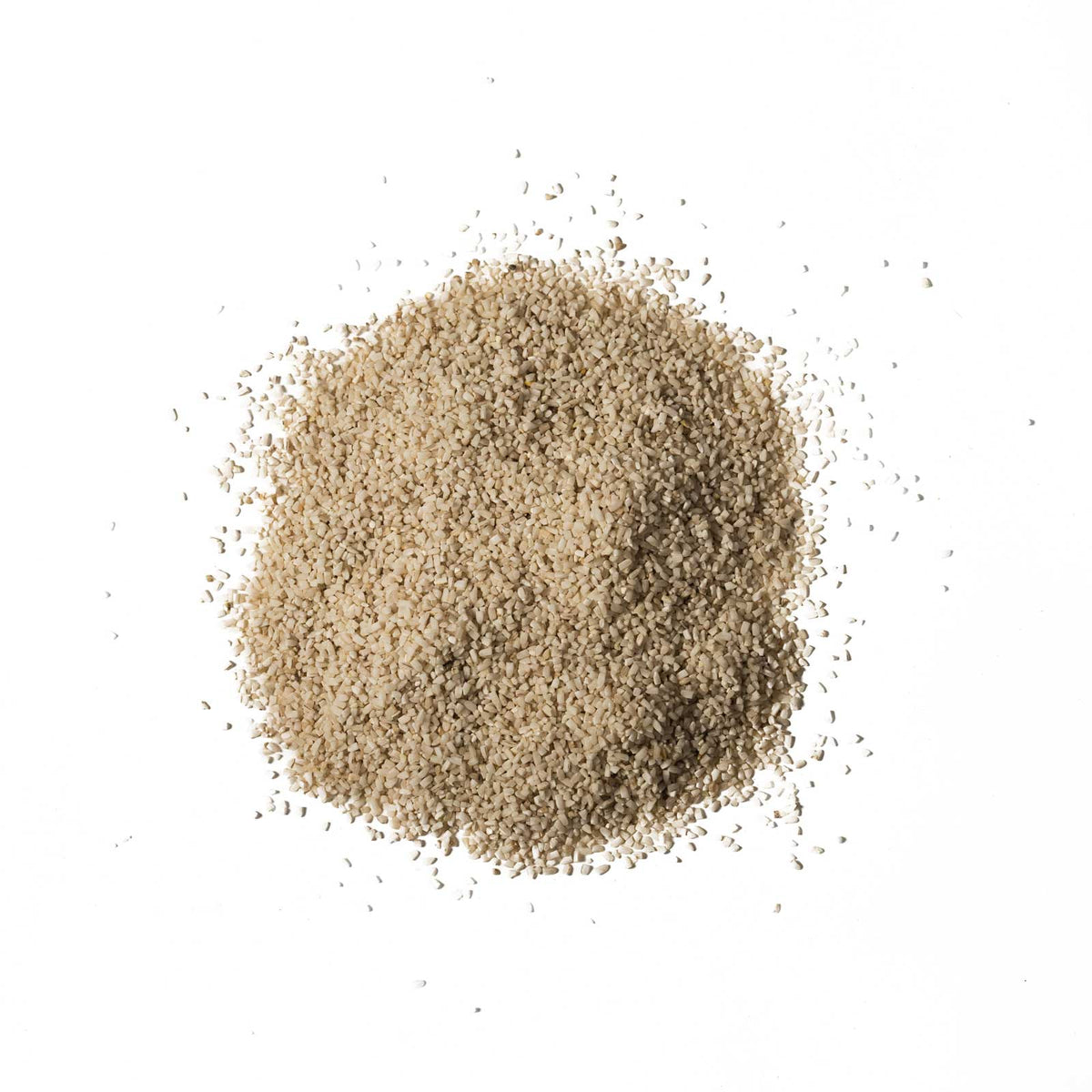 Beige sand-like material on a white background