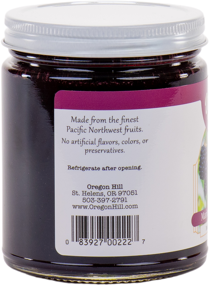 Jar of Oregon Hill fruit preserve with a label on a white background